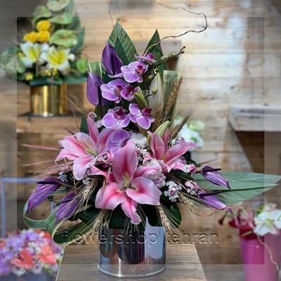 با یک سبد گل برای نوزاد ساده، حال و هوای جشن را عوض کن