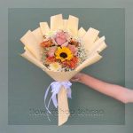 چیدمان هنری گل خانگی مقاوم برای دکور میز یا لابی